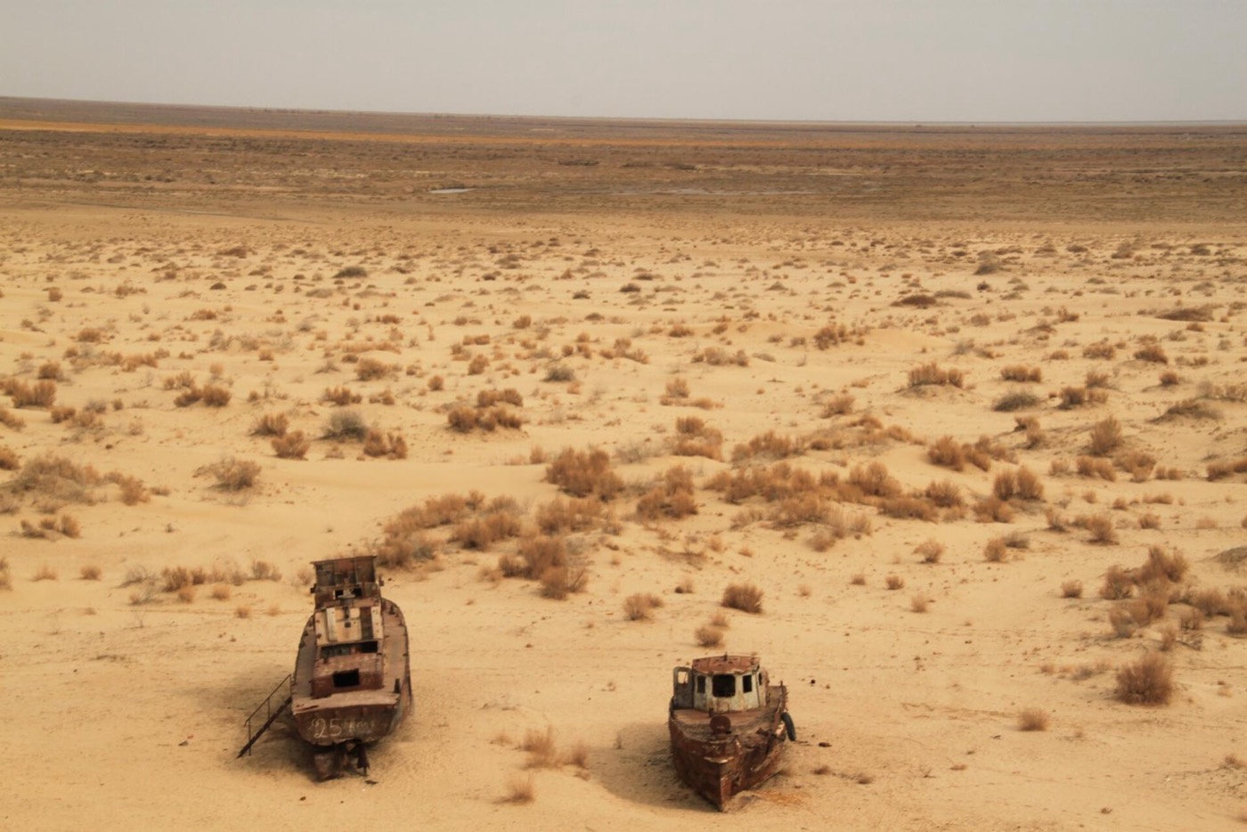 Rusting Soviet fishing vessels in the dry seabed at Muynak, Uzbekistan